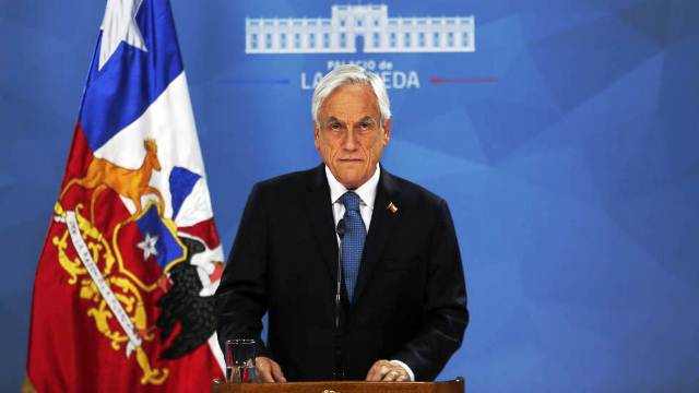 El presidente Sebastián Piñera en La Moneda. En vídeo, el discurso de Piñeda. LUIS HIDALGO (AFP) \ EPV