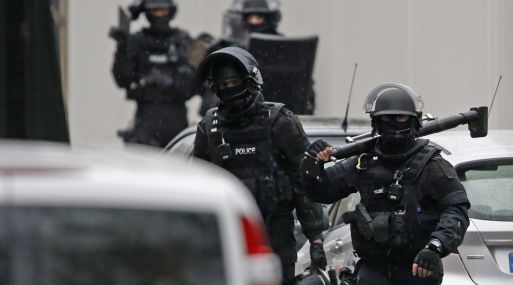 Members of French special police forces of Research and Intervention Brigade are seen at the scene of a shooting in the street of Montrouge near Paris