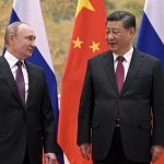 El presidente ruso, Vladimir Putin, junto a su homólogo chino, Xi Jinping