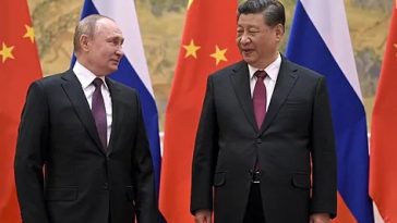 El presidente ruso, Vladimir Putin, junto a su homólogo chino, Xi Jinping