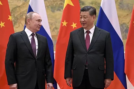 El presidente ruso, Vladimir Putin, junto a su homólogo chino, Xi Jinping